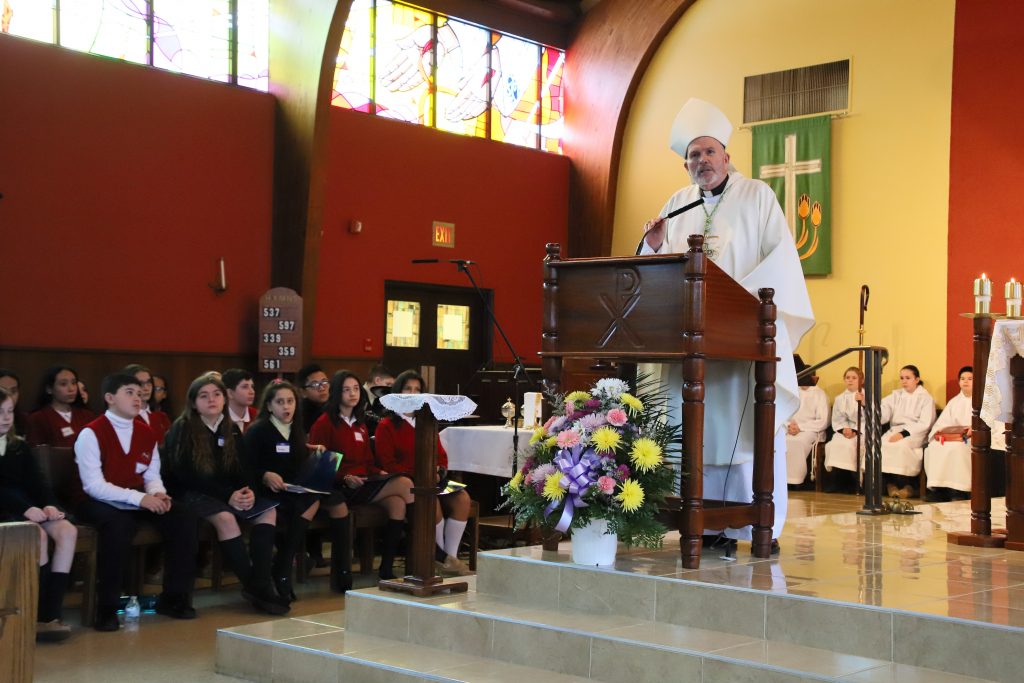 Bishop celebrates Catholic Schools Week in song with St. Veronica, St. Aloysius students